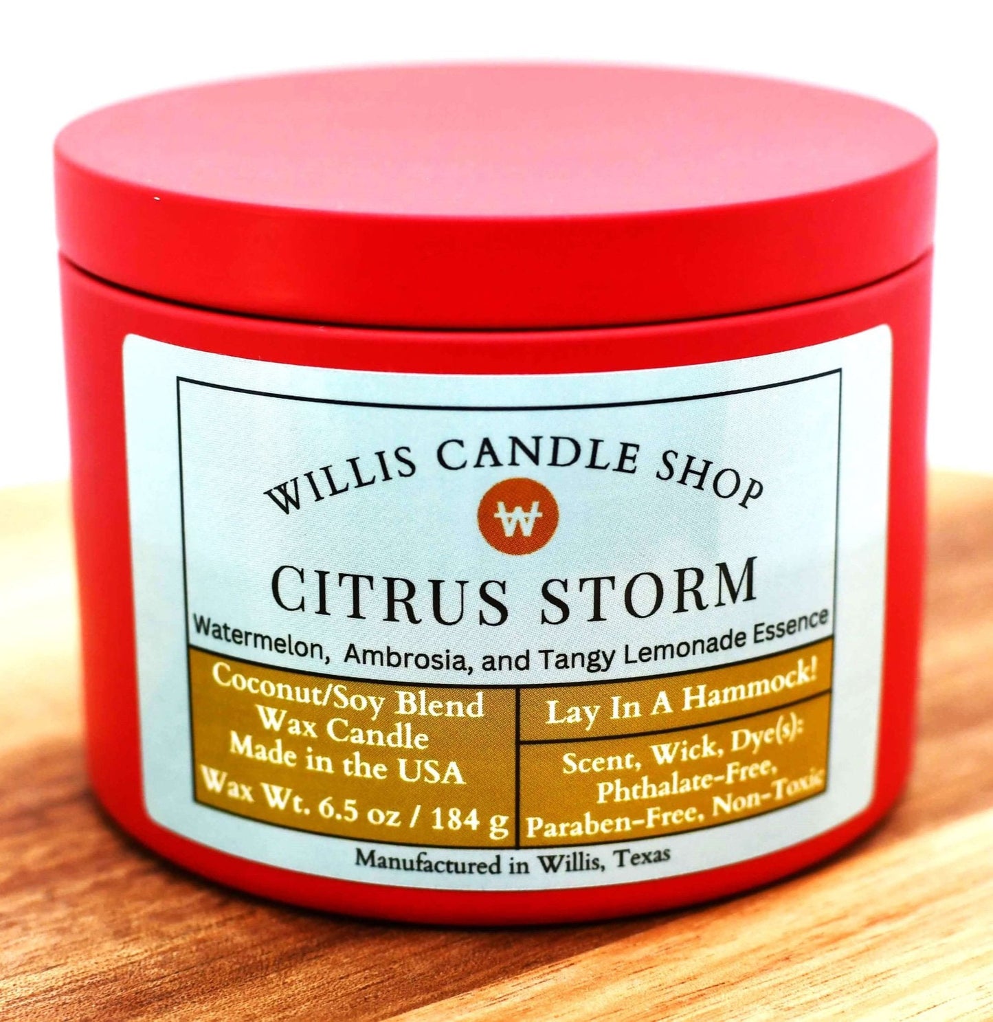 White coconut and soy 25/75 blended candle in 8 ounce red tin with 6.5 ounces of wax and Citrus Storm fragrance.