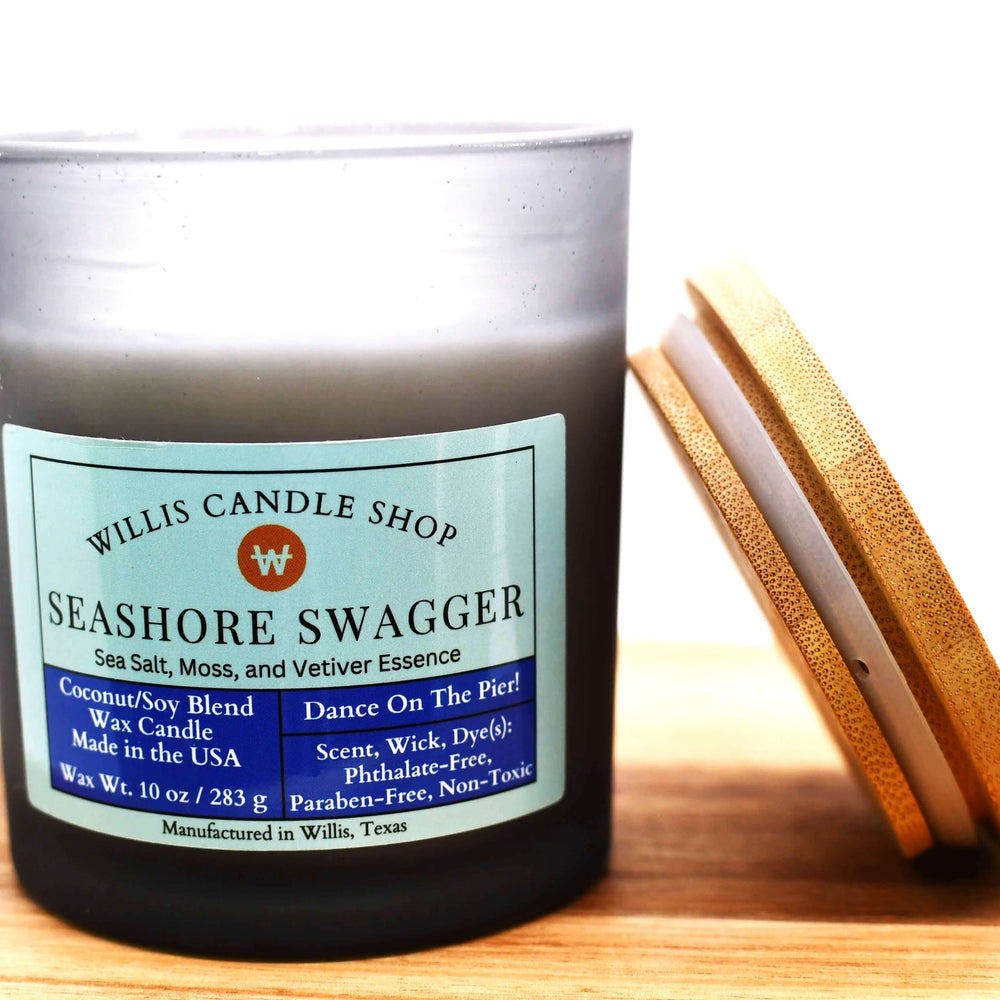 White coconut and soy 25/75 blended candle with Seashore Swagger in a 14.5 ounce black-frosted container.