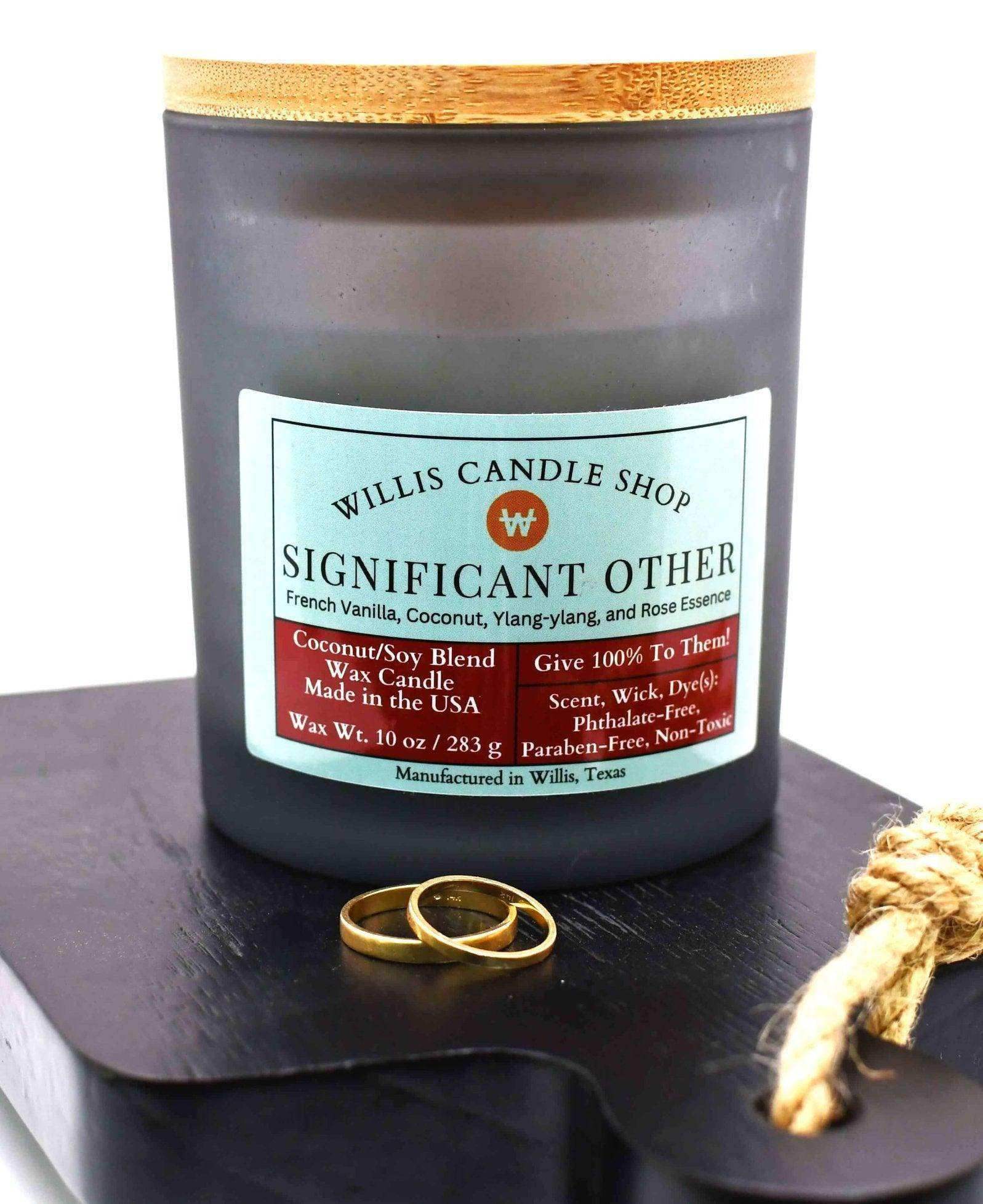 Scented candle in black frosted candle option vessel with best candle choice at Willis Candle Shop.