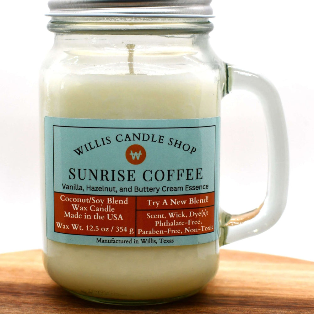 White coconut and soy 25/75 blended candle in a glass mug with Sunrise Coffee fragrance.