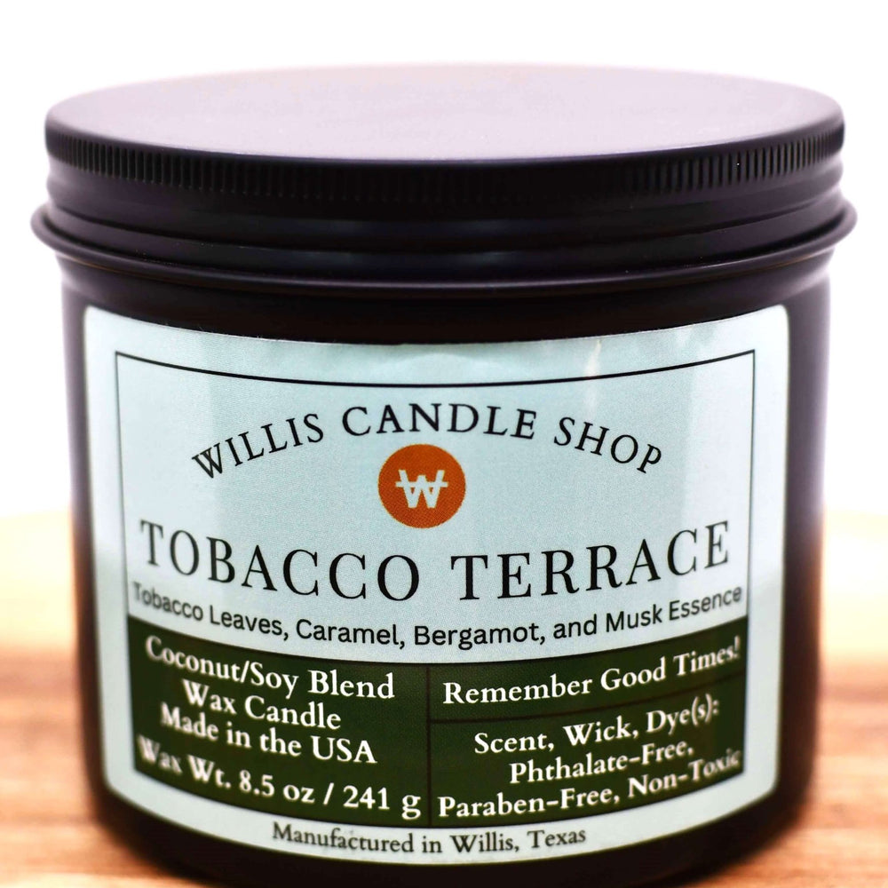 
                  
                    White Tobacco Terrace coconut and soy 25/75 blended candle in a 10 ounce black tin container.
                  
                