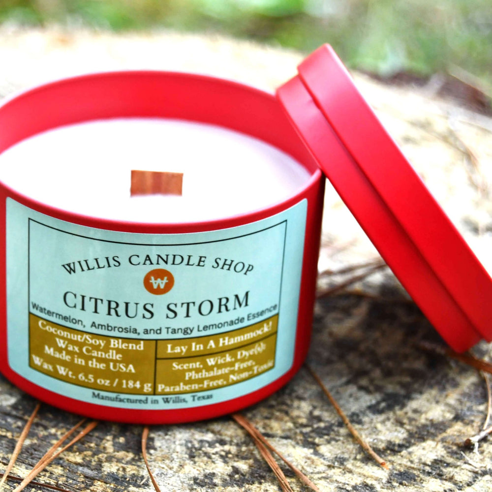 
                  
                    White wooden wick coconut and soy 25/75 blended candle in 8 ounce red tin with 6.5 ounces of wax and Citrus Storm scent.
                  
                